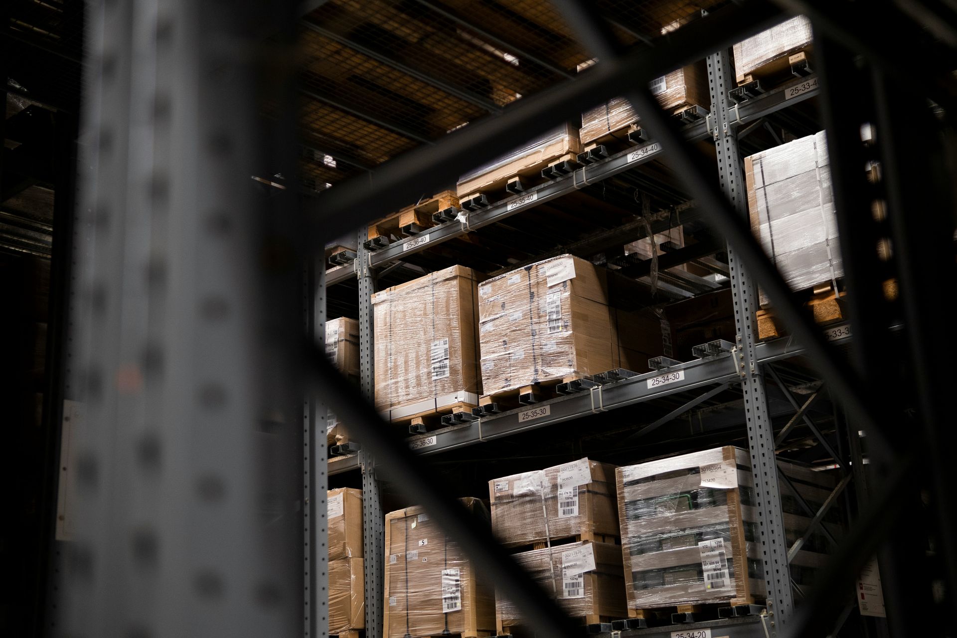Corrugated boxes and industrial packaging materials in a warehouse